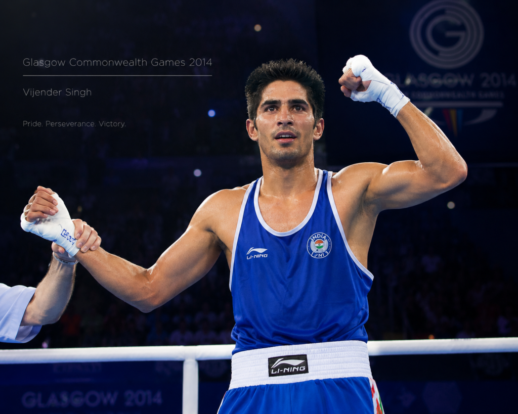 Vijender Singh celebrating victory after winning a boxing match at the Glasgow Commonwealth Games 2014.
